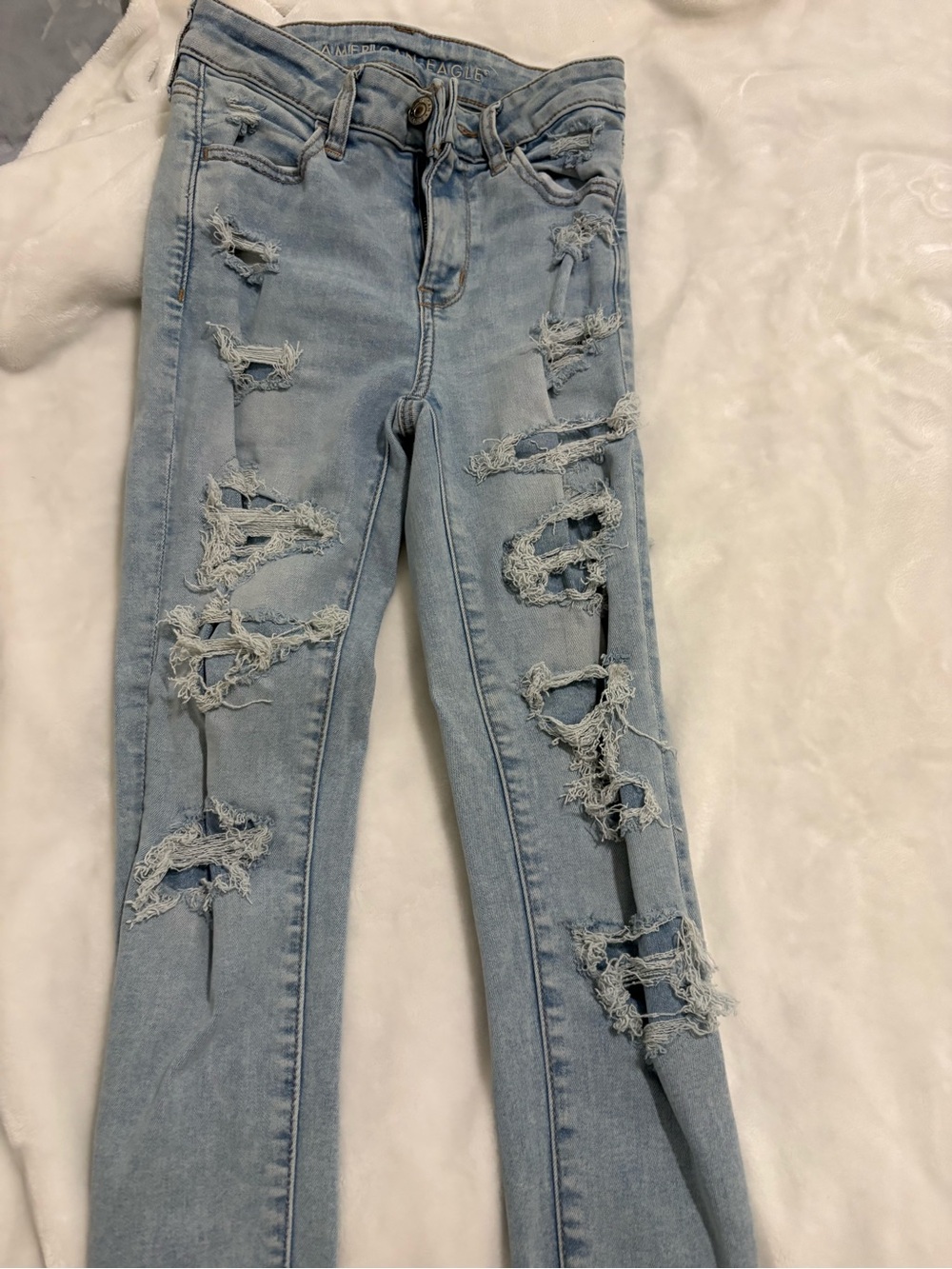 American Eagle Outfitters Light Blue Distressed Skinny Jeans